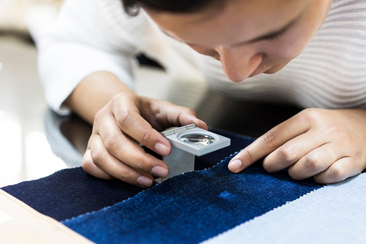 woman conducting fabric testing