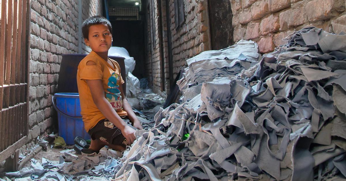 Boy with denim scraps – due diligence legislation